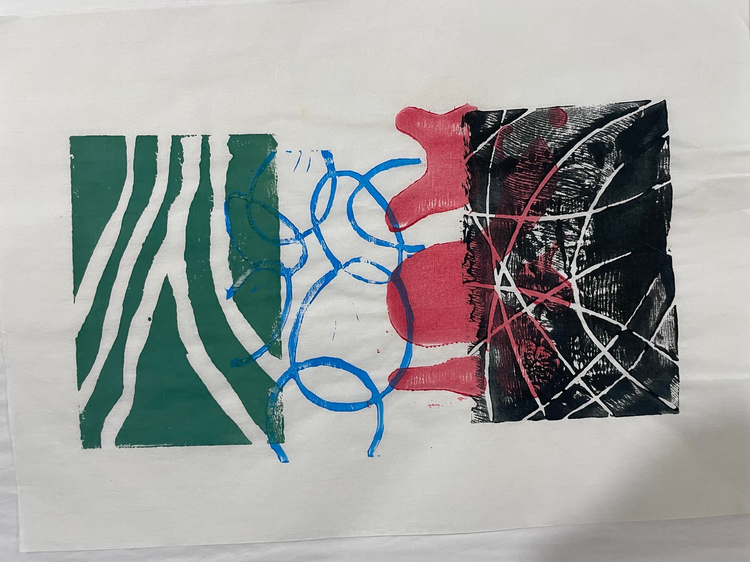 A four-block composition pulled toward greens, with looser registration on the right edge.