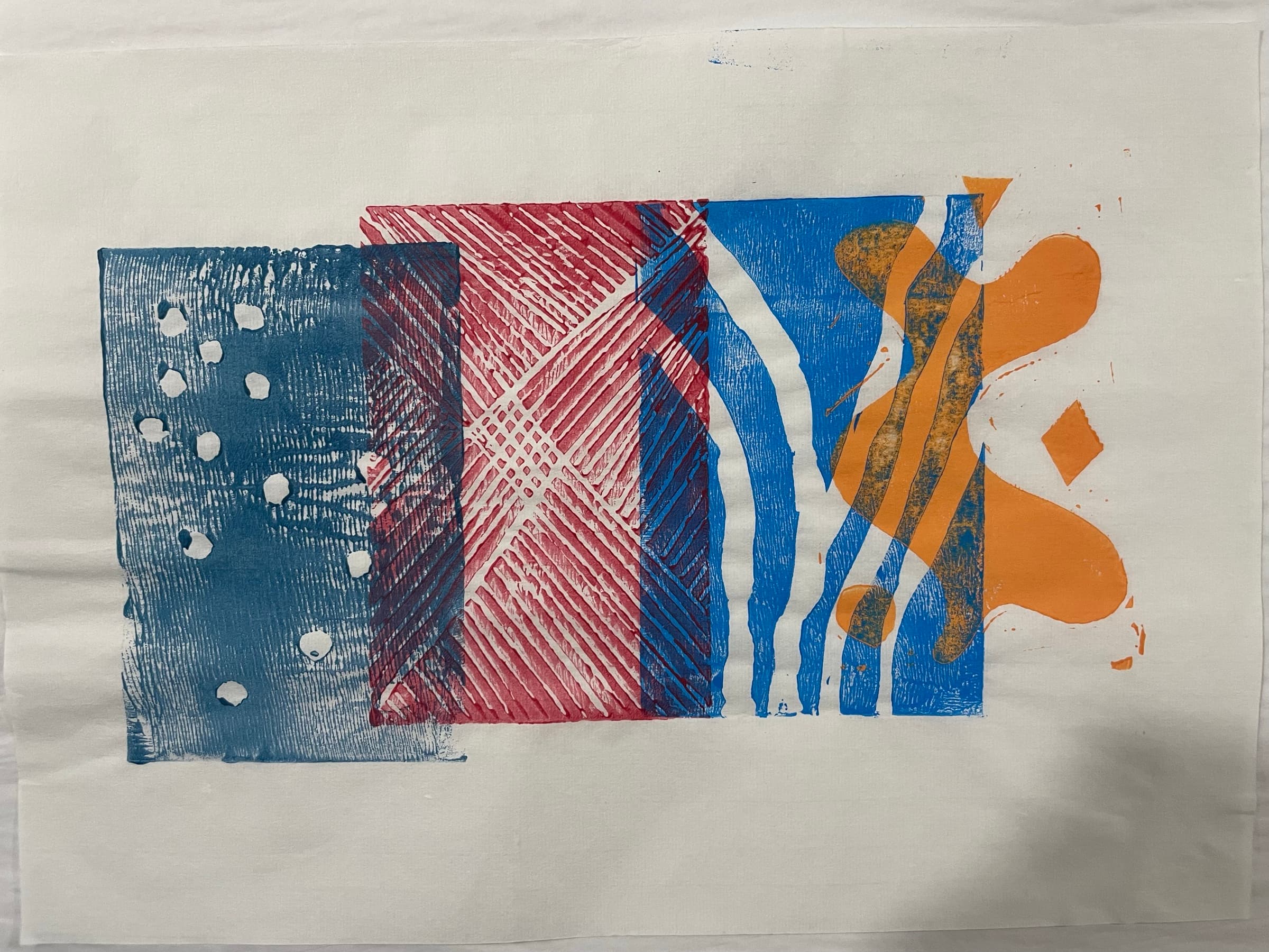 A four-block composition with a heavy black-on-blue overprint anchoring the center of the sheet.